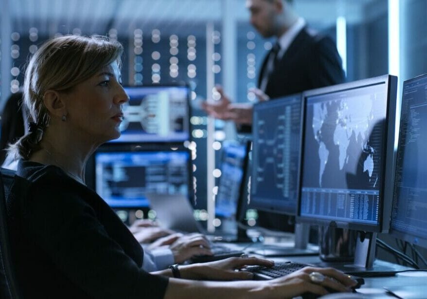 Team in front of computers during investigation